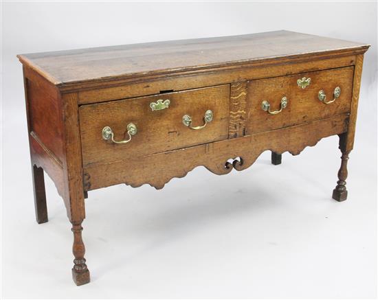 An 18th century oak dresser base, W.4ft 8in.